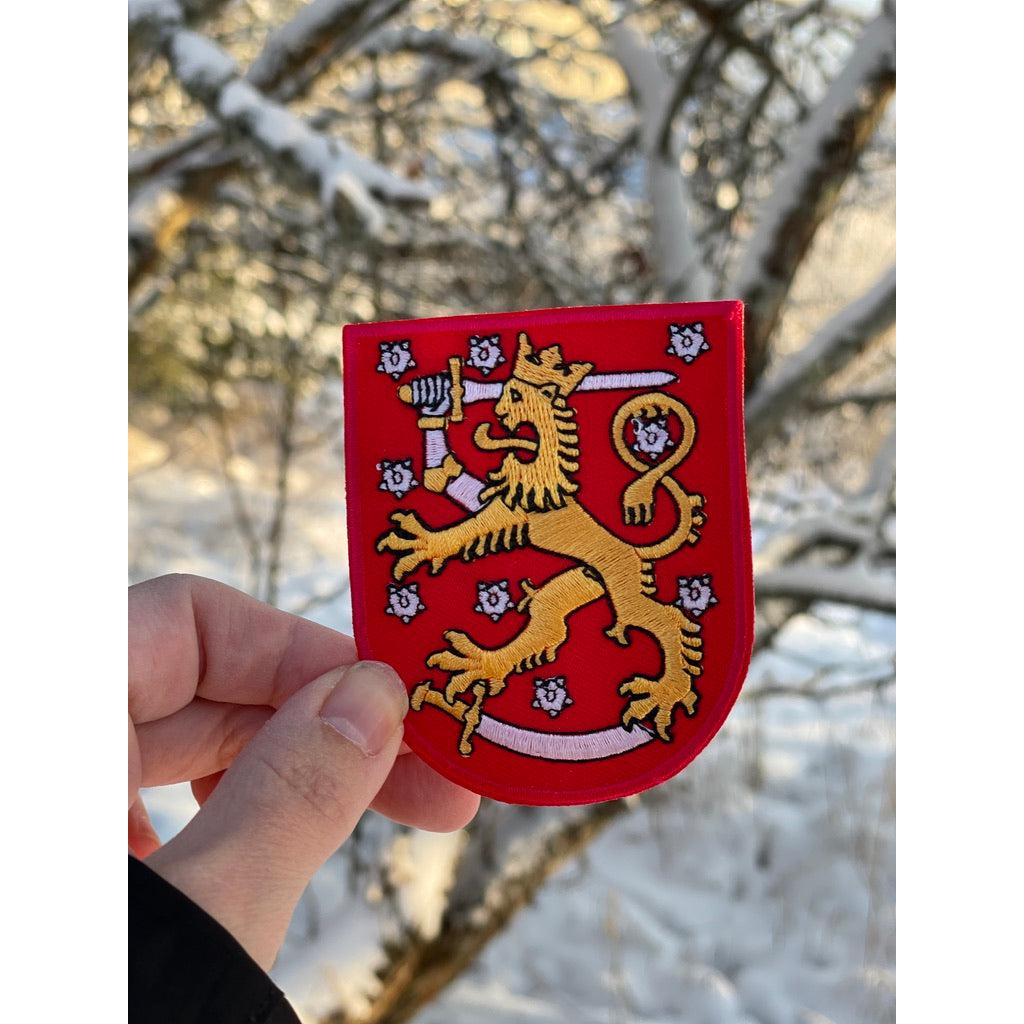 Leijona - Punainen hihamerkki - Hoopee.fi