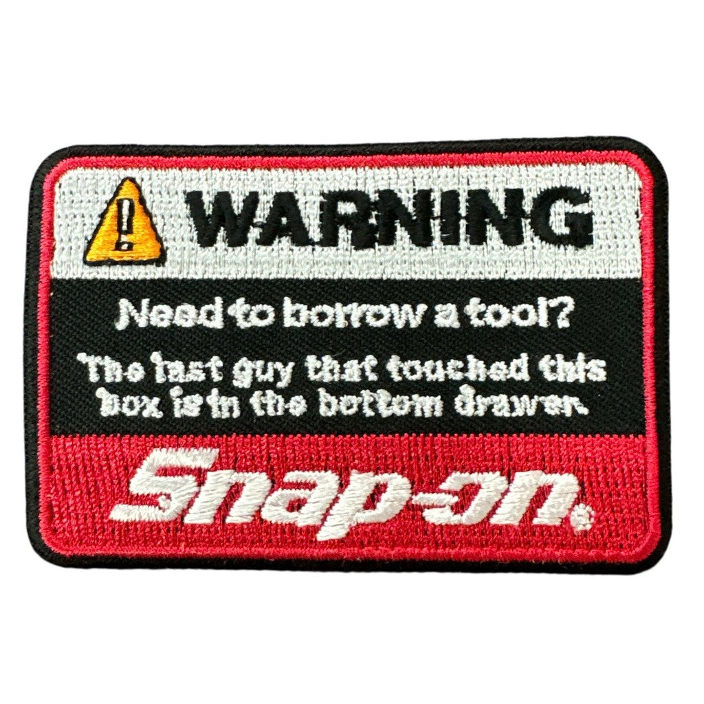 Snap-on Warning kangasmerkki - Hoopee.fi