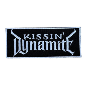 Kissin' Dynamite kangasmerkki 4×10 cm - Hoopee.fi