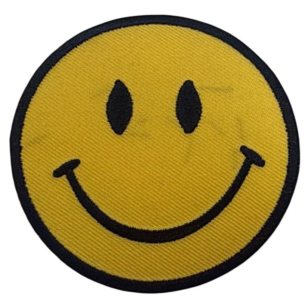 Smiley face kangasmerkki LIEVÄSTI VÄRIVIALLINEN - Hoopee.fi